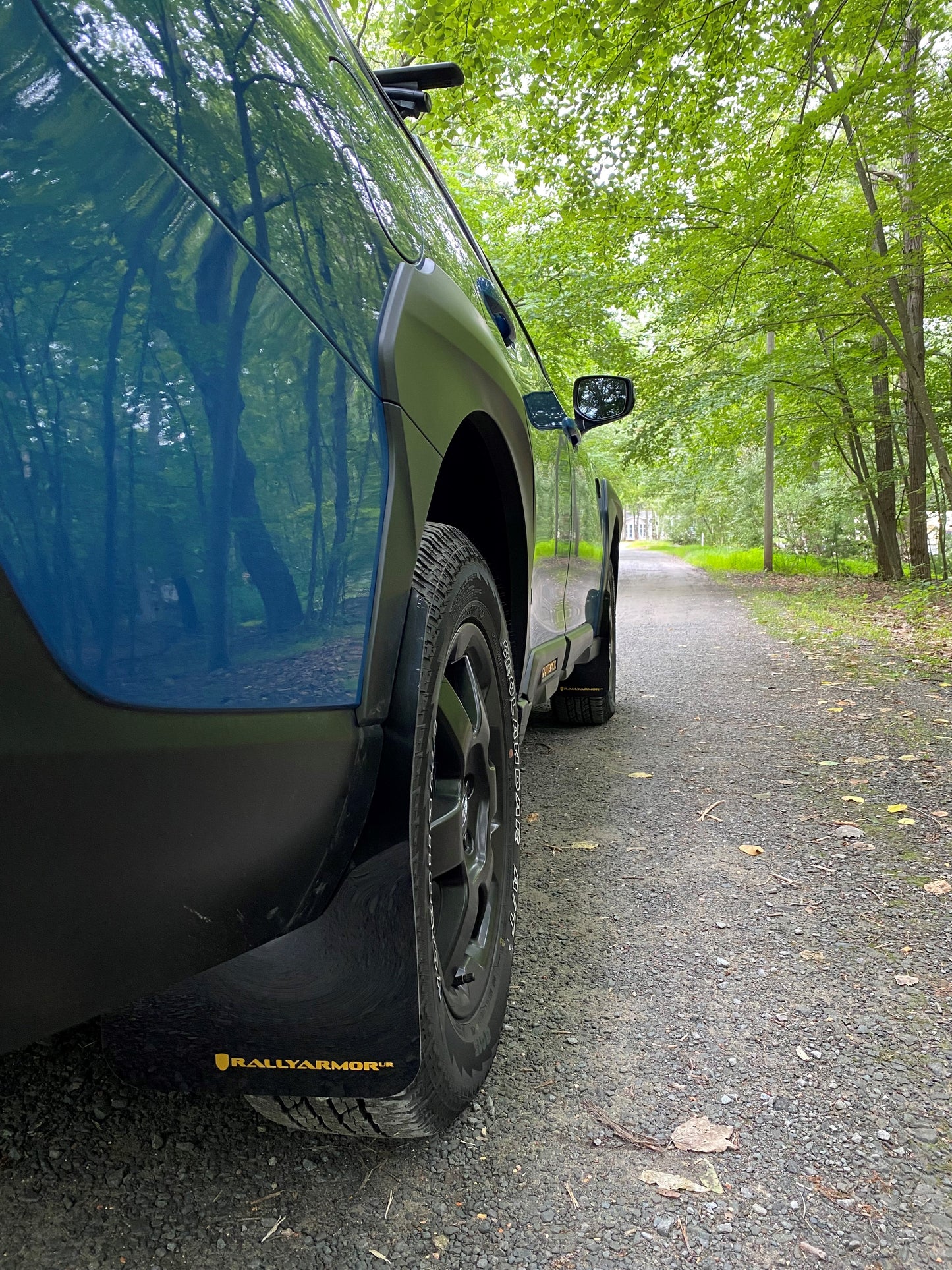 Rally Armor Mud Flaps Subaru Outback Wilderness 2022-23 (Black/Wild Orange Logo)